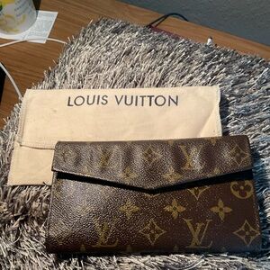 LV, wallet. Good pre-loved condition.